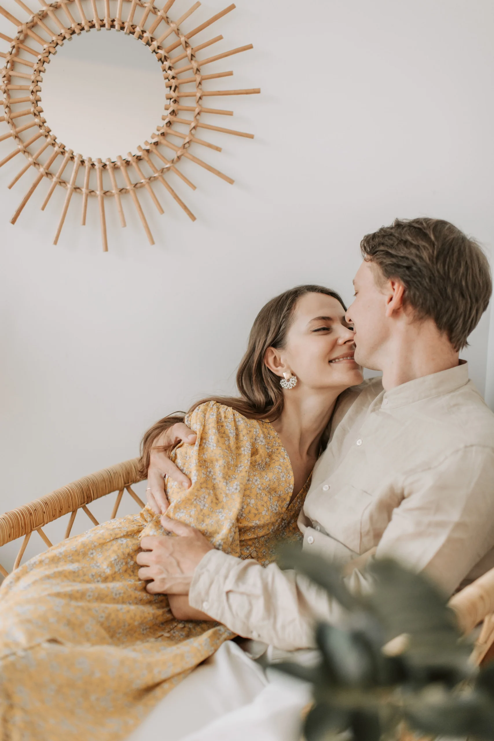 Happy couple embracing at home, representing comfortable lifestyle