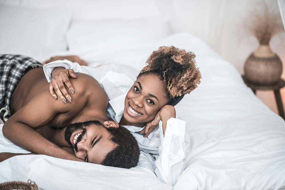 Cute young African adult relaxing