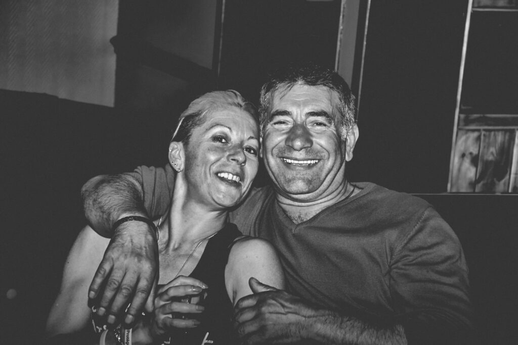 A happy couple embracing and smiling together